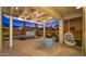 Charming outdoor dining area with a view of the pool and patio, ideal for summer gatherings at 3953 E Lafayette Ave, Gilbert, AZ 85298