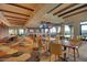 Spacious restaurant area with comfortable seating, TVs, and stylish decor for a premium dining experience at 3953 E Lafayette Ave, Gilbert, AZ 85298