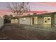 Spacious backyard featuring brick-paved patio and multiple covered living areas at 4410 N 20Th Ave, Phoenix, AZ 85015