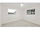 Bedroom featuring tile flooring, white walls and natural lighting at 4410 N 20Th Ave, Phoenix, AZ 85015