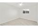 Comfortable bedroom with tile flooring, ceiling fan and large windows at 4410 N 20Th Ave, Phoenix, AZ 85015