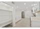 Bright, updated kitchen featuring white cabinets, quartz countertops, and stainless steel appliances at 4410 N 20Th Ave, Phoenix, AZ 85015