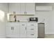 Well-equipped kitchenette features modern appliances, sleek cabinets, and a compact design at 4410 N 20Th Ave, Phoenix, AZ 85015