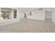 Spacious living room with tile flooring, providing access to other rooms in the house at 4410 N 20Th Ave, Phoenix, AZ 85015