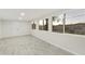 Bright, open living room with tile flooring and large windows for ample natural light at 4410 N 20Th Ave, Phoenix, AZ 85015