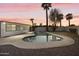 Backyard pool with new patio, palm trees and white fence at 4410 N 20Th Ave, Phoenix, AZ 85015
