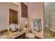 Classic bathroom with a shower, and toilet, plus a custom vanity at 4431 E Gemini Pl, Chandler, AZ 85249