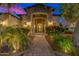 Inviting stone entryway with manicured landscaping leading to the decorative front door at 4431 E Gemini Pl, Chandler, AZ 85249