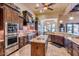 Modern kitchen featuring stainless steel appliances and central island at 4431 E Gemini Pl, Chandler, AZ 85249