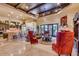 Spacious living room with high ceilings, hardwood flooring, fireplace, and ample seating at 4431 E Gemini Pl, Chandler, AZ 85249