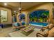 Relaxing outdoor living space with a pool view and comfortable seating area at 4431 E Gemini Pl, Chandler, AZ 85249