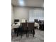 The dining area provides ample seating with natural light at 4610 W Indianola Ave, Phoenix, AZ 85031