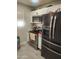 Modern kitchen with stainless steel appliances and white cabinets at 4610 W Indianola Ave, Phoenix, AZ 85031