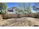 Desert-landscaped backyard features a neutral color palette, offering a calming outdoor space at 4750 W Saddlehorn Rd, Phoenix, AZ 85083
