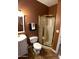 Bathroom with a shower featuring a glass door, a single sink vanity and dark paint at 4750 W Saddlehorn Rd, Phoenix, AZ 85083