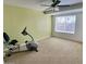 Bright bedroom with carpet floor, ceiling fan, and a window allowing ample natural light at 4750 W Saddlehorn Rd, Phoenix, AZ 85083