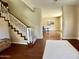 Inviting entrance hall with hardwood floors and open view to the formal living room at 4750 W Saddlehorn Rd, Phoenix, AZ 85083