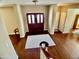 View of the main entrance hall showcasing beautiful hardwood floors and curved architectural details at 4750 W Saddlehorn Rd, Phoenix, AZ 85083