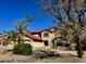 Charming two-story home with a red tile roof and a well-manicured front yard at 4750 W Saddlehorn Rd, Phoenix, AZ 85083