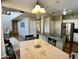 The bright and open kitchen provides ample counter space, stainless steel appliances and flows into the adjacent living areas at 4750 W Saddlehorn Rd, Phoenix, AZ 85083