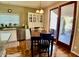 This sunny kitchen showcases white cabinetry, granite counters, stainless appliances, and French doors leading to the patio at 4750 W Saddlehorn Rd, Phoenix, AZ 85083