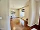 Bright living room featuring hardwood floors, large window, and neutral paint at 4750 W Saddlehorn Rd, Phoenix, AZ 85083