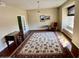 Large formal sitting area features a decorative rug, wood floors, and natural lighting at 4750 W Saddlehorn Rd, Phoenix, AZ 85083