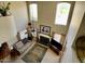 This aerial view showcases the living room's fireplace, soaring windows, and comfortable furniture at 4750 W Saddlehorn Rd, Phoenix, AZ 85083