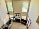 Spacious living room featuring high ceilings, fireplace, and large windows at 4750 W Saddlehorn Rd, Phoenix, AZ 85083