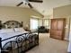 Spacious main bedroom with vaulted ceilings, large windows, and a sitting area at 4750 W Saddlehorn Rd, Phoenix, AZ 85083