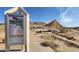 Picture of the trailhead with map and covered picnic area at Honda Road Conservation Park at 4750 W Saddlehorn Rd, Phoenix, AZ 85083