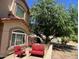 Cozy outdoor patio seating area next to the house at 4750 W Saddlehorn Rd, Phoenix, AZ 85083