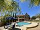 Backyard oasis featuring a sparkling pool and spa, perfect for outdoor entertaining and relaxation at 4750 W Saddlehorn Rd, Phoenix, AZ 85083