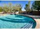 Sparkling blue pool provides a tranquil escape with sun loungers for relaxation at 4750 W Saddlehorn Rd, Phoenix, AZ 85083