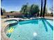 Enjoy the sparkling pool and built-in spa with a beautiful desert landscape at 4750 W Saddlehorn Rd, Phoenix, AZ 85083
