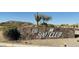 Beautiful sign for The 500 Club, a wonderful golf and recreation club, with natural desert plants at 4750 W Saddlehorn Rd, Phoenix, AZ 85083
