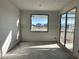 Bedroom featuring a large window with scenic views and sliding glass door at 5631 W Summerside Rd, Laveen, AZ 85339
