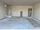 Spacious garage with high ceilings and ample room for storage at 5631 W Summerside Rd, Laveen, AZ 85339