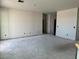 Large living room featuring neutral walls and a modern, open design at 5631 W Summerside Rd, Laveen, AZ 85339