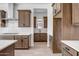 Well-appointed kitchen with modern appliances, subway tile backsplash, and wood cabinetry at 5733 W Saint Moritz Ln, Glendale, AZ 85306