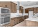 Well-equipped kitchen featuring stainless steel appliances, ample cabinet space, and sleek countertops at 5733 W Saint Moritz Ln, Glendale, AZ 85306