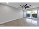 Spacious bedroom with fan, patio door to let natural light in at 6125 E Indian School Rd # 131, Scottsdale, AZ 85251