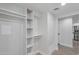 Walk-in closet with built-in shelving for optimal storage at 6125 E Indian School Rd # 131, Scottsdale, AZ 85251