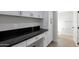 The laundry room boasts ample storage and a sleek countertop at 6125 E Indian School Rd # 131, Scottsdale, AZ 85251