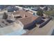 Well-maintained home featuring a spacious driveway, attached garage, and low-maintenance desert landscaping at 6242 E Hearn Rd, Scottsdale, AZ 85254