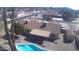 Well-maintained property with a neatly landscaped yard, covered patio, and refreshing backyard pool at 6242 E Hearn Rd, Scottsdale, AZ 85254