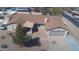 Charming single-story home with a well-manicured front yard, desert landscaping, and a spacious two-car garage at 6242 E Hearn Rd, Scottsdale, AZ 85254