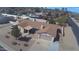 Charming single-Gathering home with a well-maintained brown roof and a convenient attached garage at 6242 E Hearn Rd, Scottsdale, AZ 85254