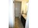 Bathroom featuring double sinks, granite countertop, and tile flooring at 6242 E Hearn Rd, Scottsdale, AZ 85254