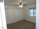 Bedroom includes neutral carpet, good light, and double closets at 6242 E Hearn Rd, Scottsdale, AZ 85254
